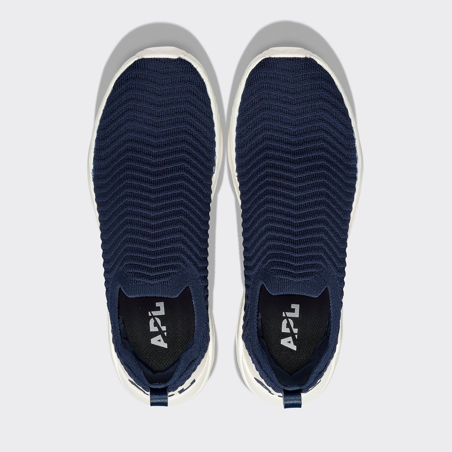 APL Men’s TechLoom Traveler Slip-On Sneakers, Navy / Ivory