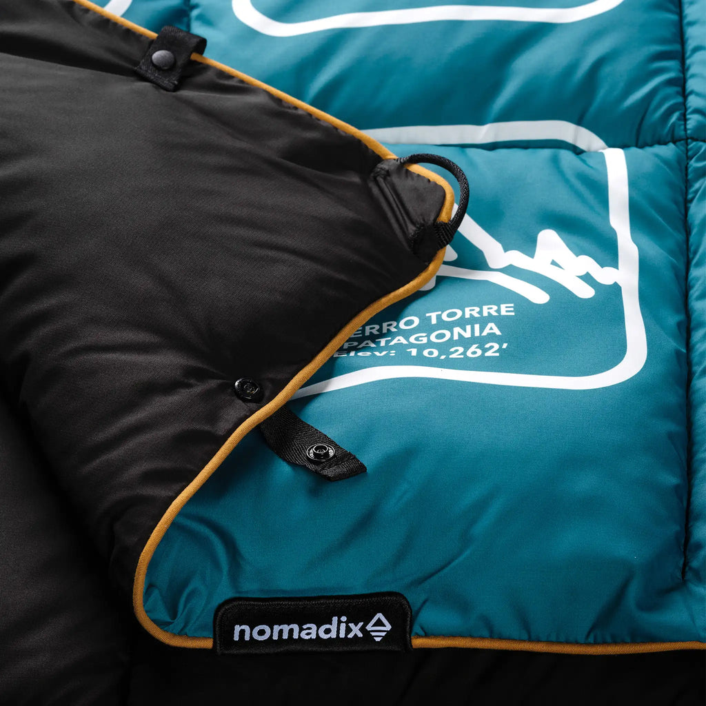 Nomadix Graphene Puffer Blanket: Peaks of the World Teal Ocean