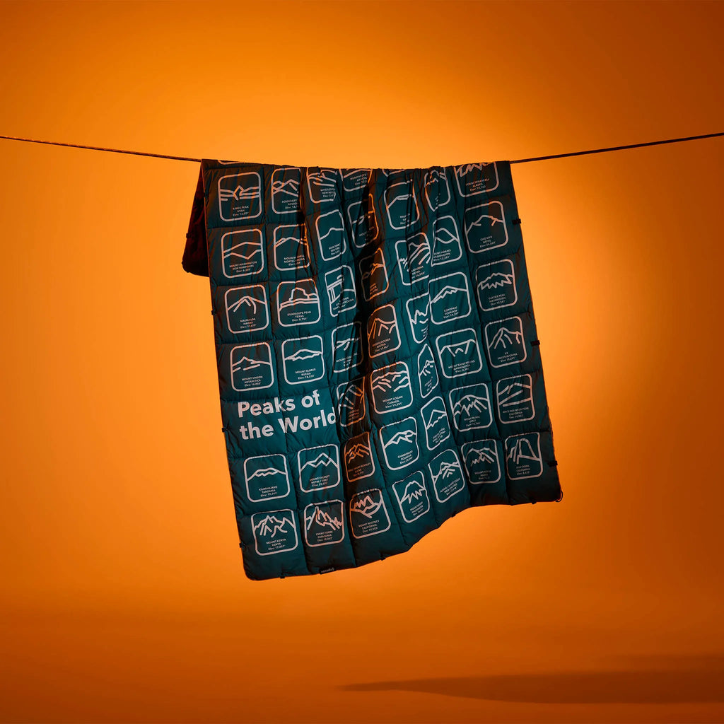 Nomadix Graphene Puffer Blanket: Peaks of the World Teal Ocean