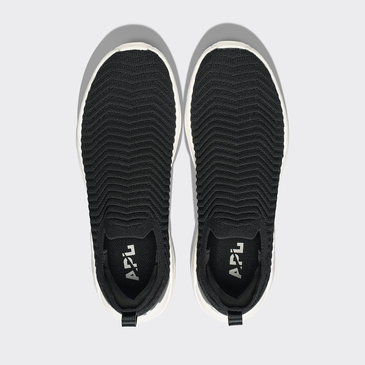 APL Women’s TechLoom Traveler Slip-On Sneakers, Black / Ivory