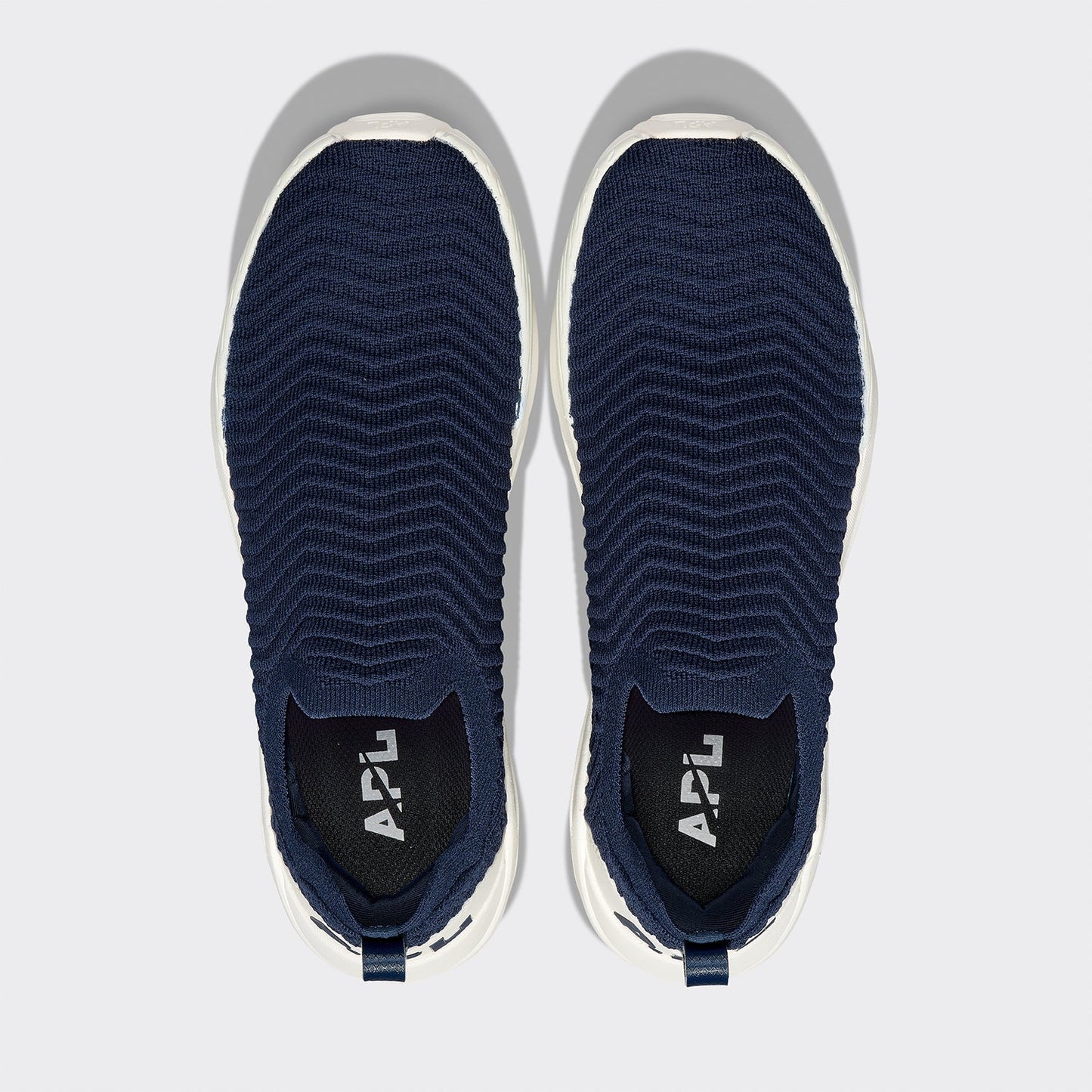 APL Women’s TechLoom Traveler Slip-On Sneakers, Navy / Ivory